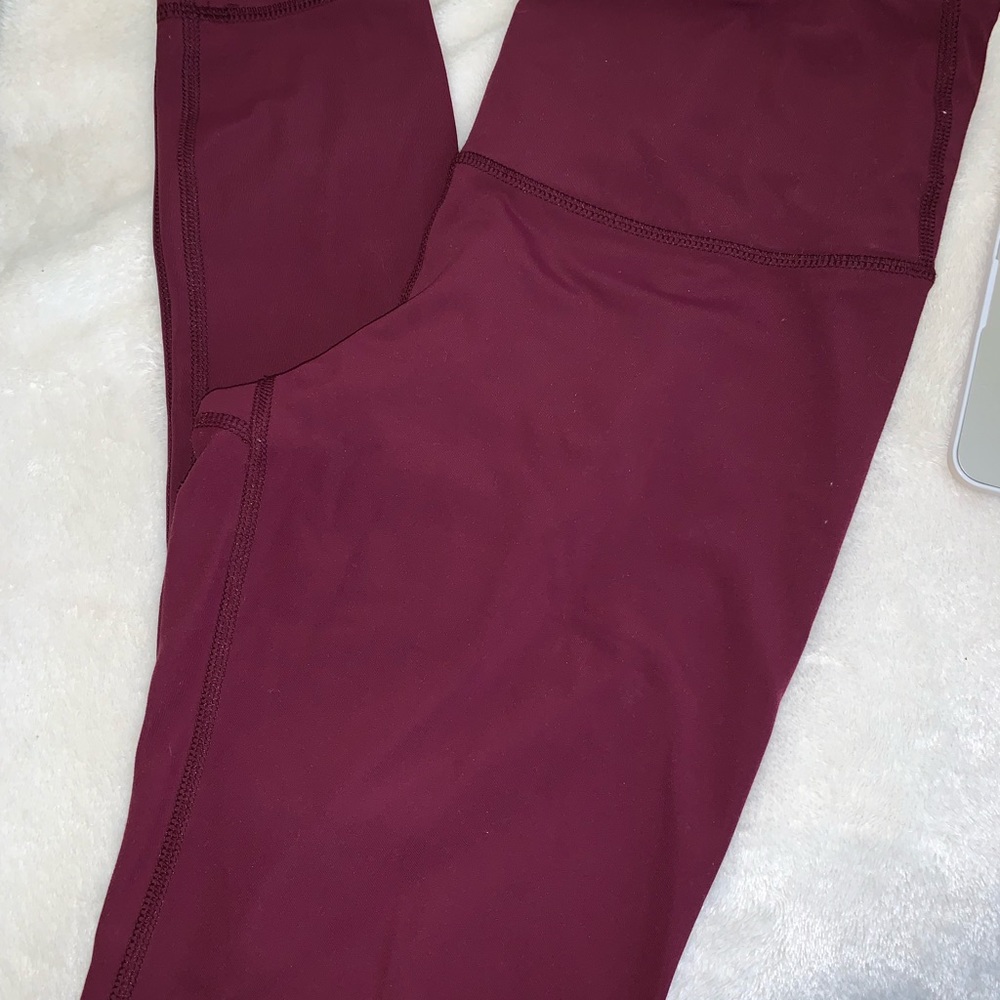 Raspberry colored leggings